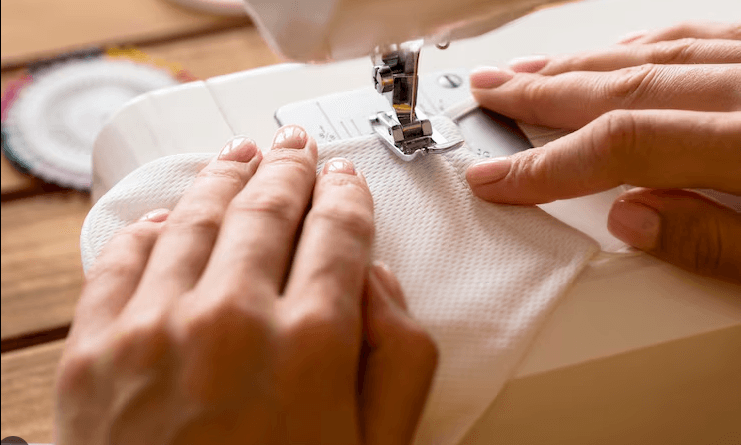 Priya S. wearing their blouse stitching